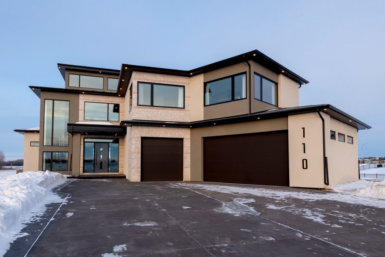 Contemporary two-storey Decora home with stone detailing, at 110 Greenbryre